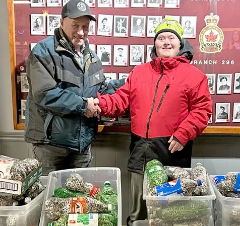 Greg Blagdon with donated pop tabs